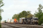 NS 7668 leads train 214 past the rear of train 213